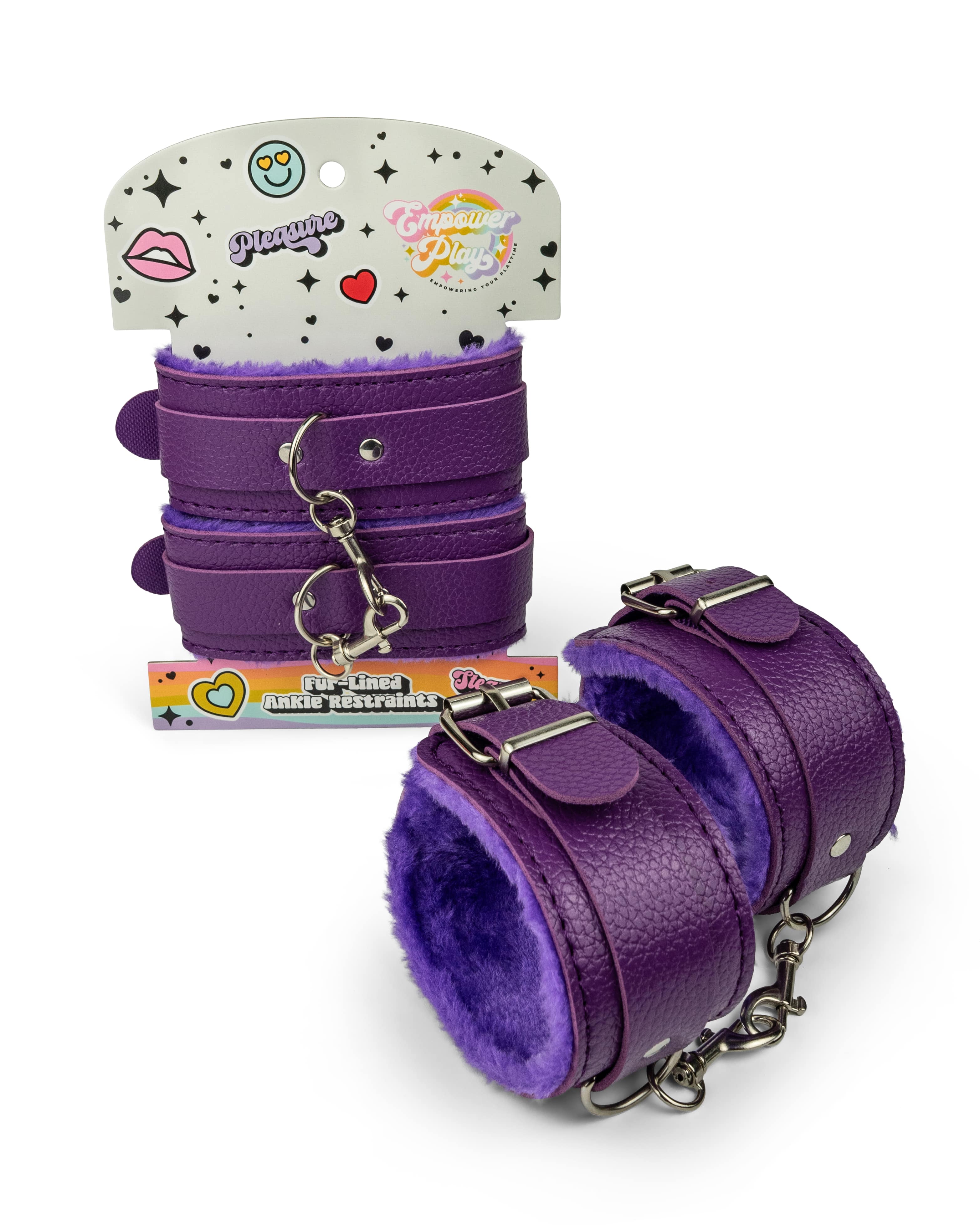 Cosmic purple BDSM ankle cuffs with plush fur lining displayed with packaging for soft bondage restraint