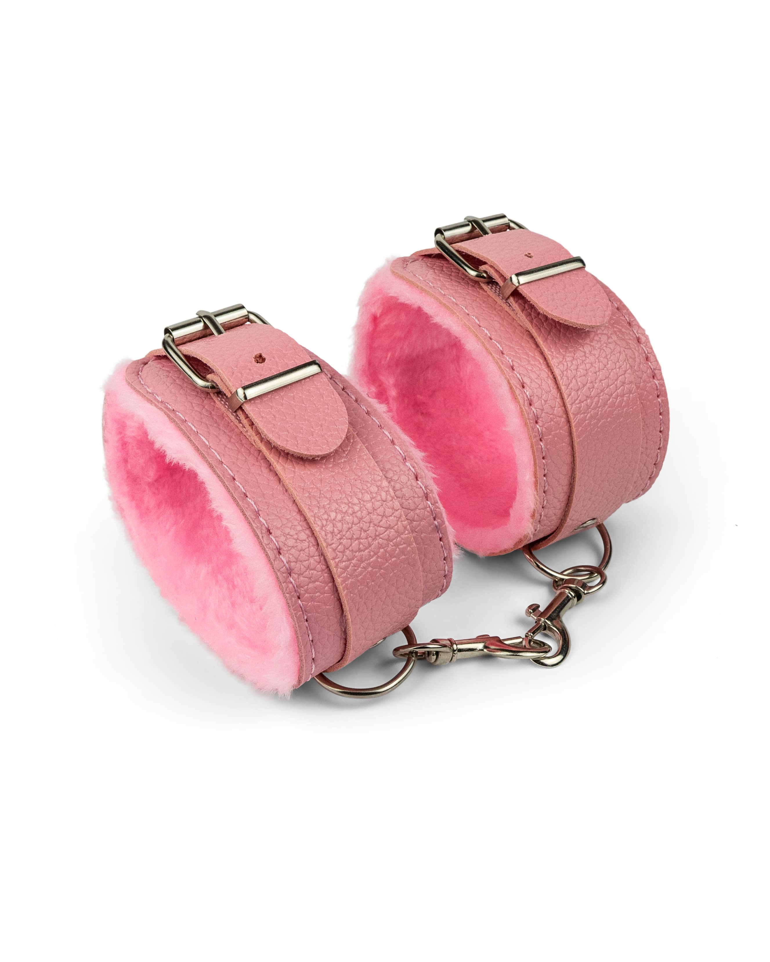 Cupcake pink BDSM ankle cuffs featuring soft fur lining and adjustable straps for comfortable restraint play