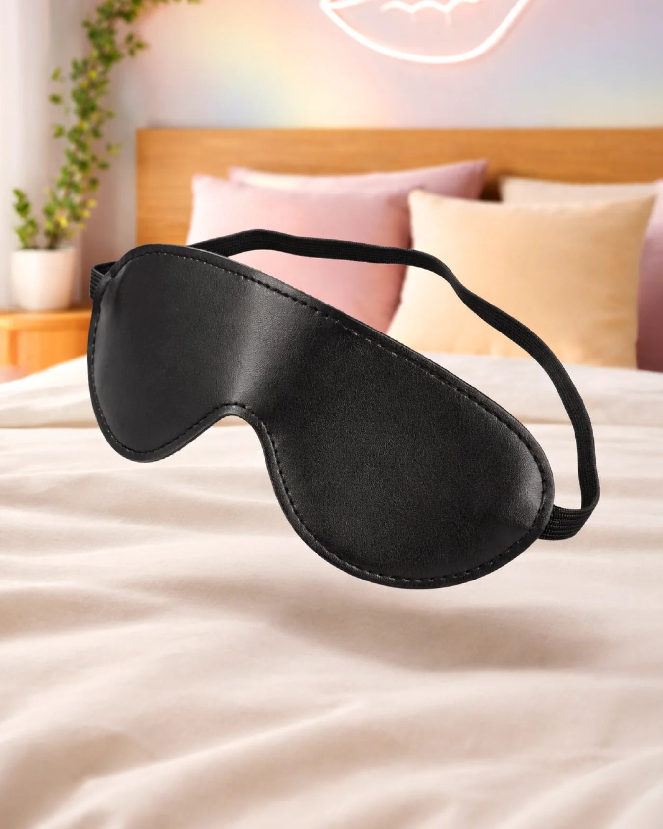 Empower Play™ black faux leather BDSM blindfold for beginners — padded interior for sensory deprivation