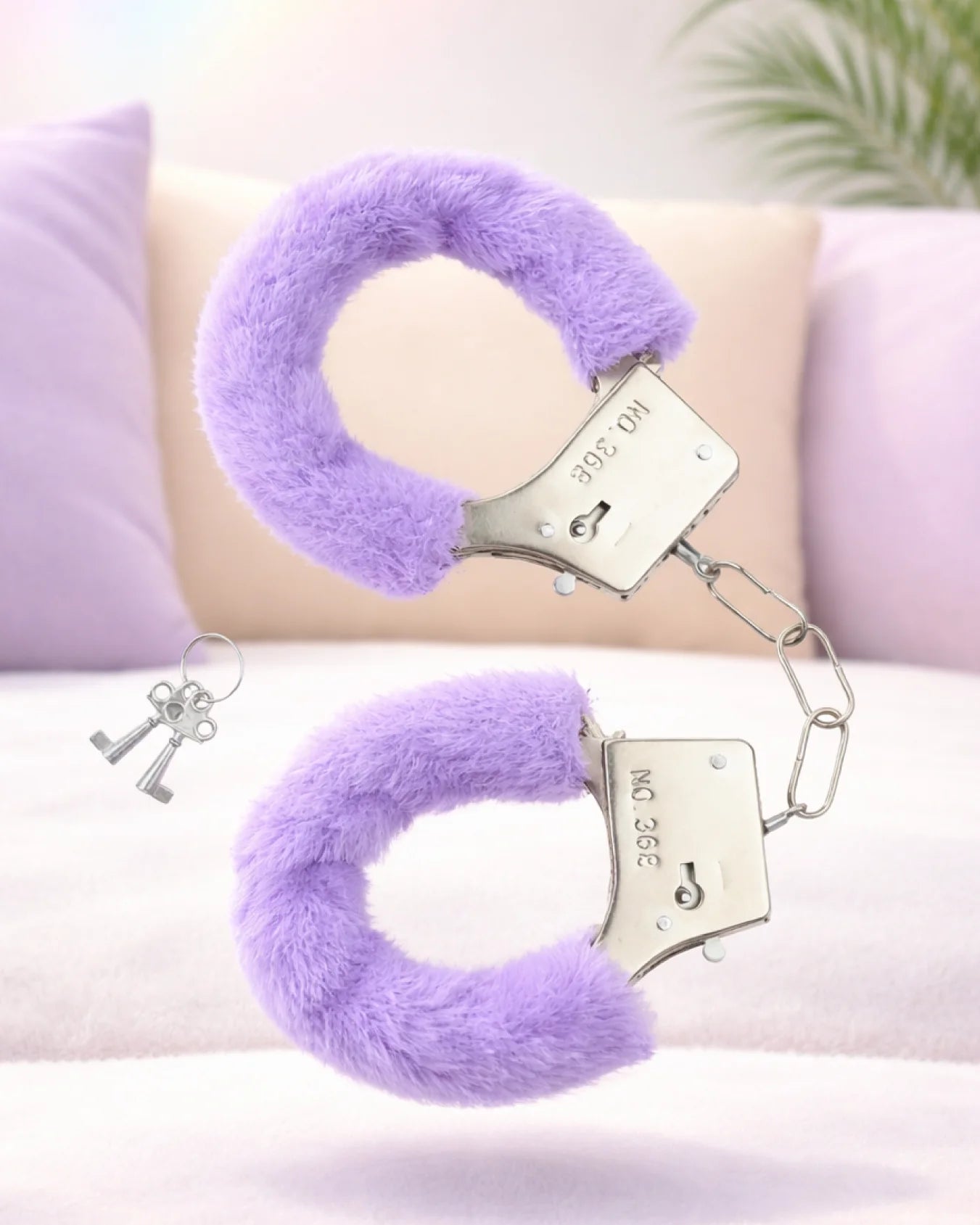 Purple furry BDSM handcuffs with plush faux fur lining and adjustable straps for soft bondage restraint and comfortable fit