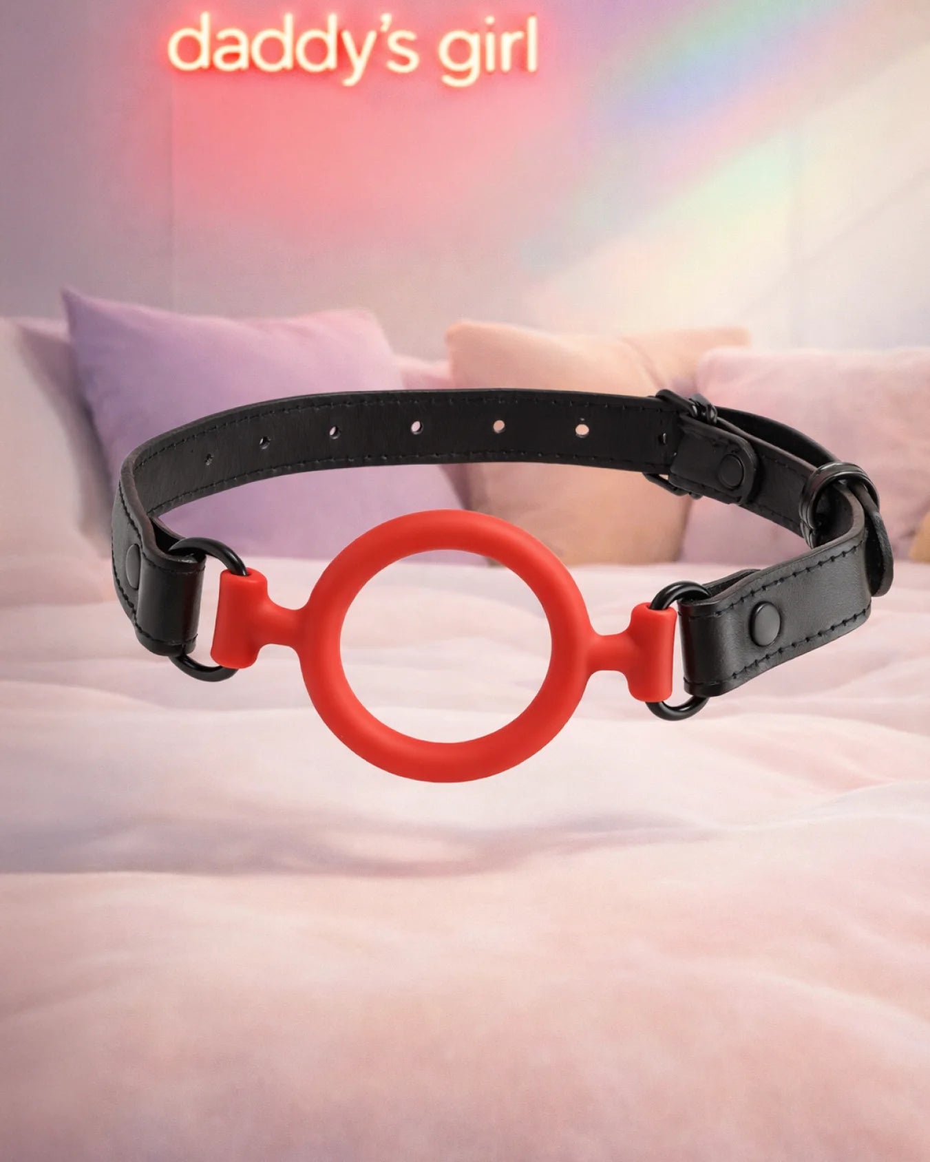 Red silicone O-ring gag by Empower Play™ with open-mouth ring design and adjustable strap for expressive mouth restraint