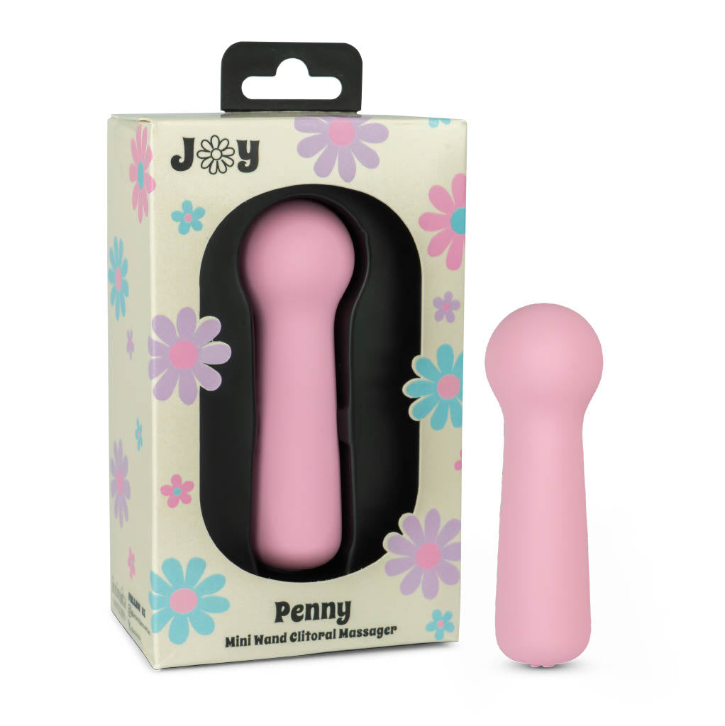 Joy Penny mini wand clitoral massager in pastel pink shown with retail packaging for compact external stimulation