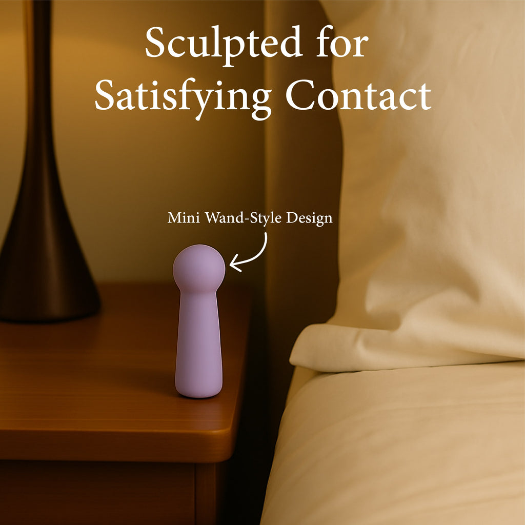 Pastel Purple Joy Penny mini wand vibrator styled on bedside table highlighting discreet wand design
