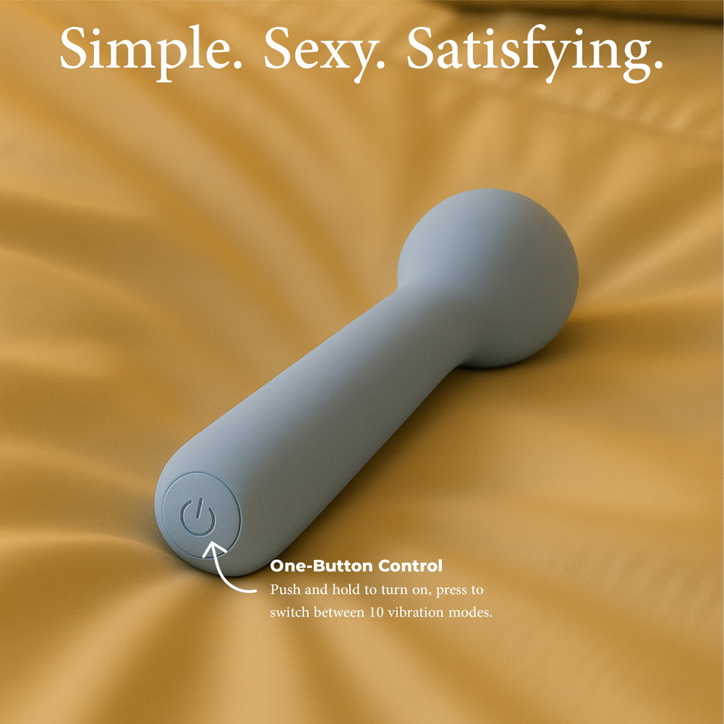 Pastel Blue Joy Penny mini wand vibrator with single button operation for easy mode switching
