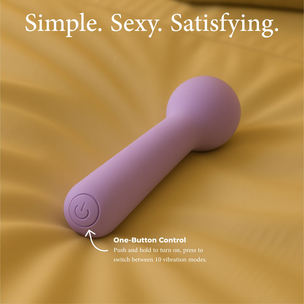 Joy Penny mini wand vibrator in purple showing single button control for vibration modes