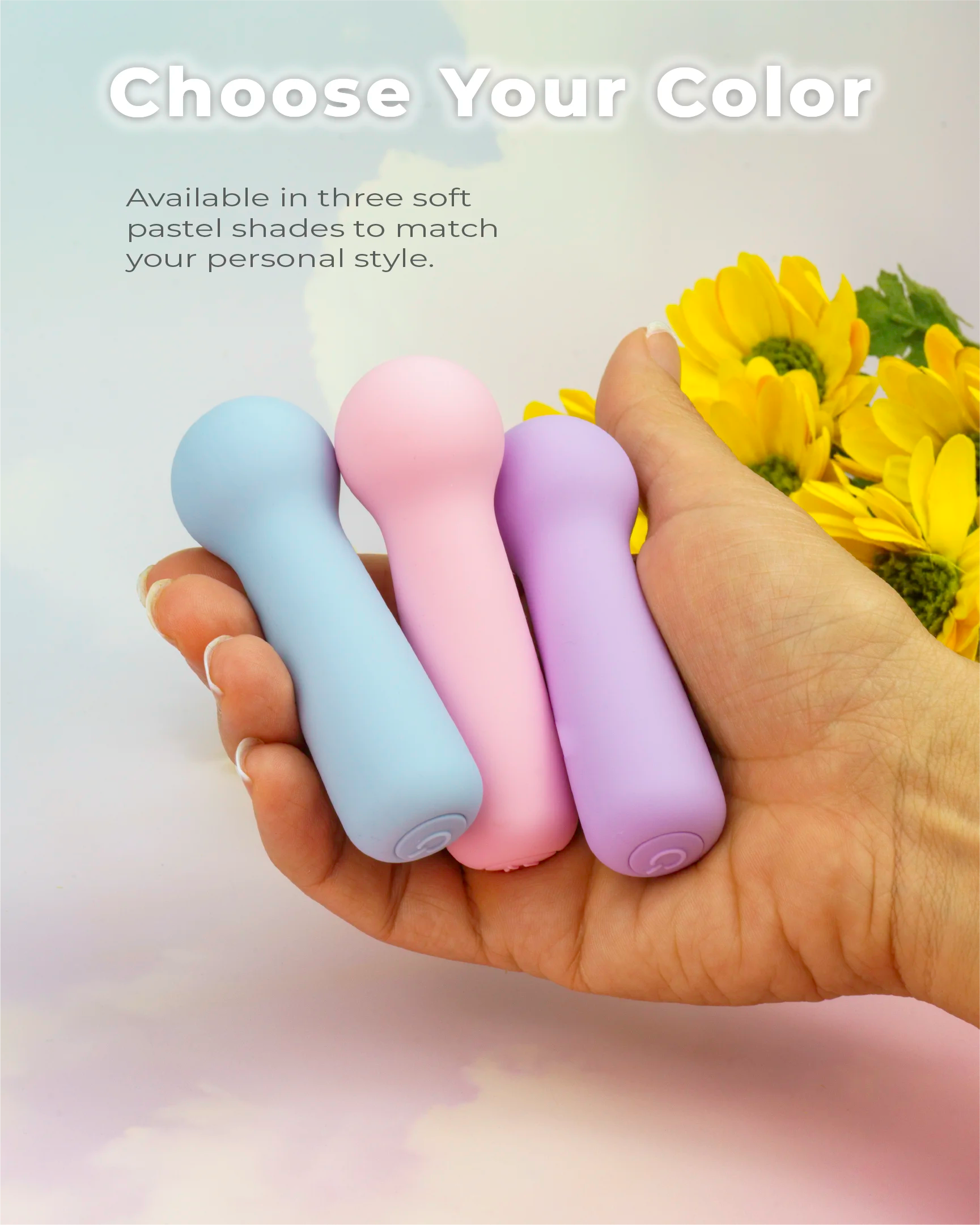 Joy Penny mini wand vibrators in pastel pink, purple and blue shown in hand, compact ergonomic design with rounded wand heads and smooth silicone finish