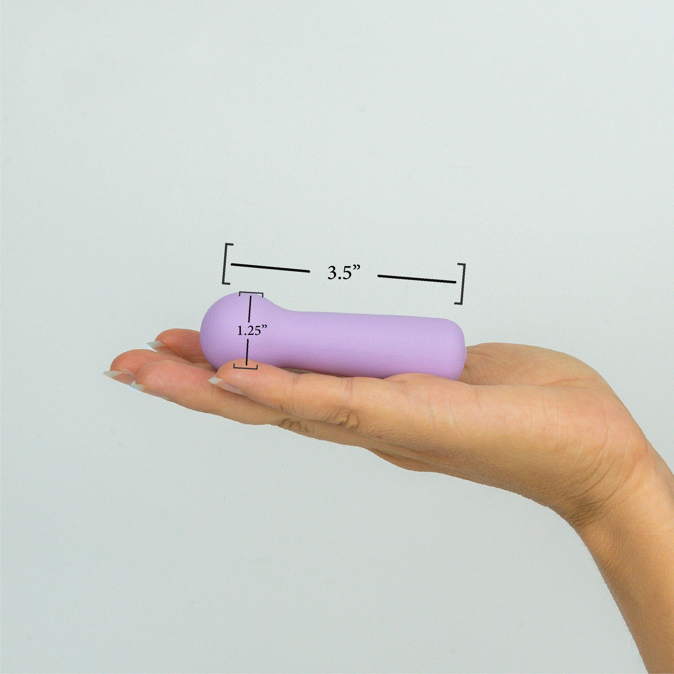 Joy Penny mini wand vibrator in pastel purple showing 3.5 inch length and rounded wand head