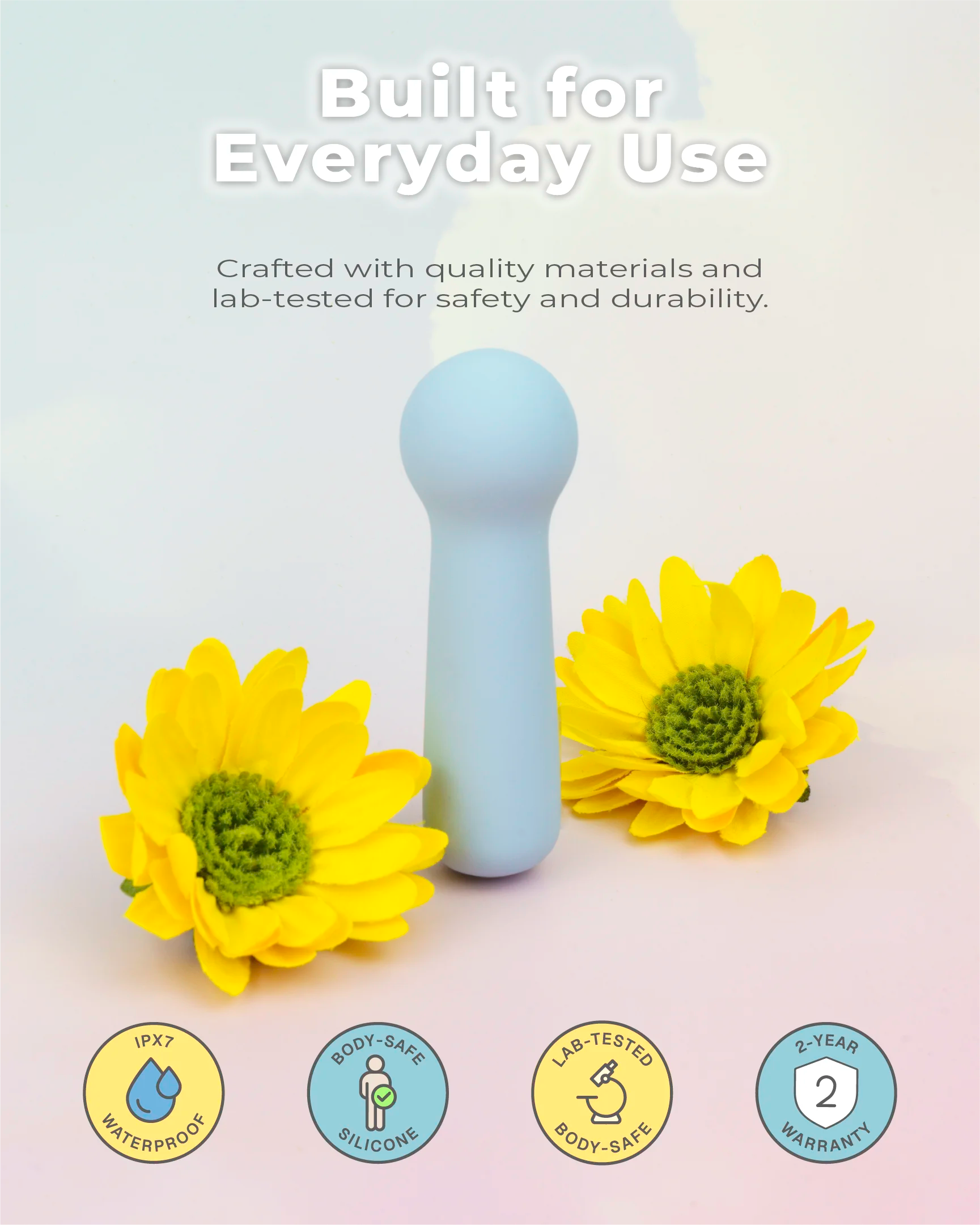 Pastel blue Joy Penny mini wand vibrator made with lab-tested materials, soft silicone body and reliable rechargeable performance