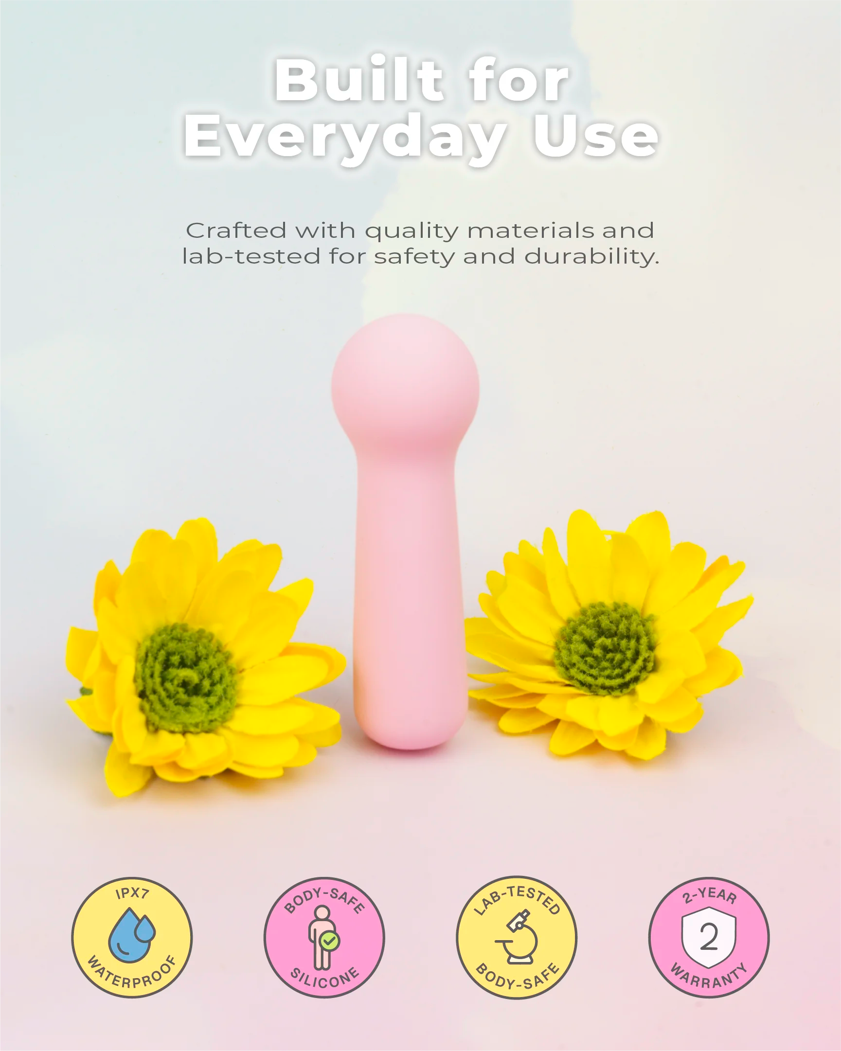 Pastel pink Joy Penny mini wand vibrator built for everyday use with lab-tested materials, soft silicone body and reliable rechargeable performance