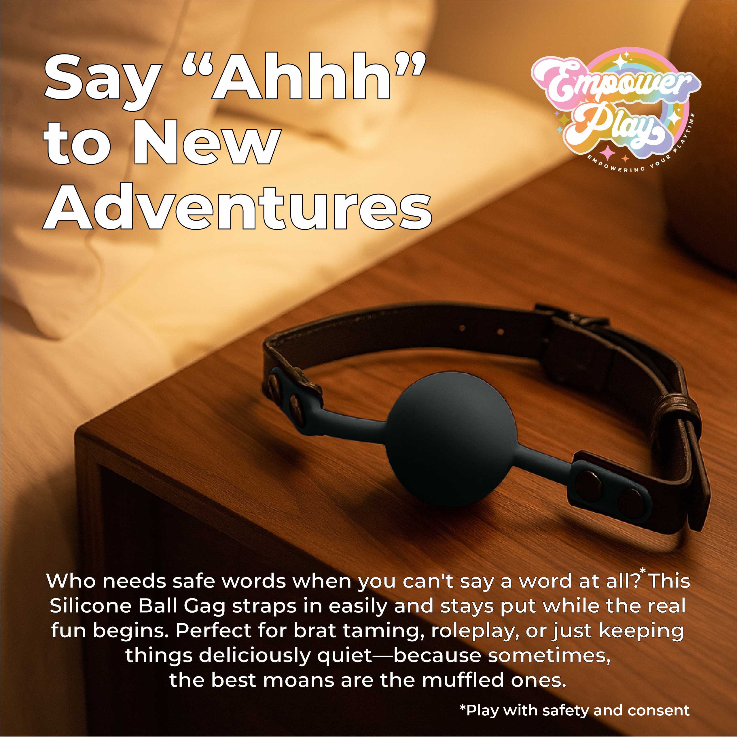 Midnight black silicone ball gag in bedroom lifestyle scene, classic BDSM mouth gag