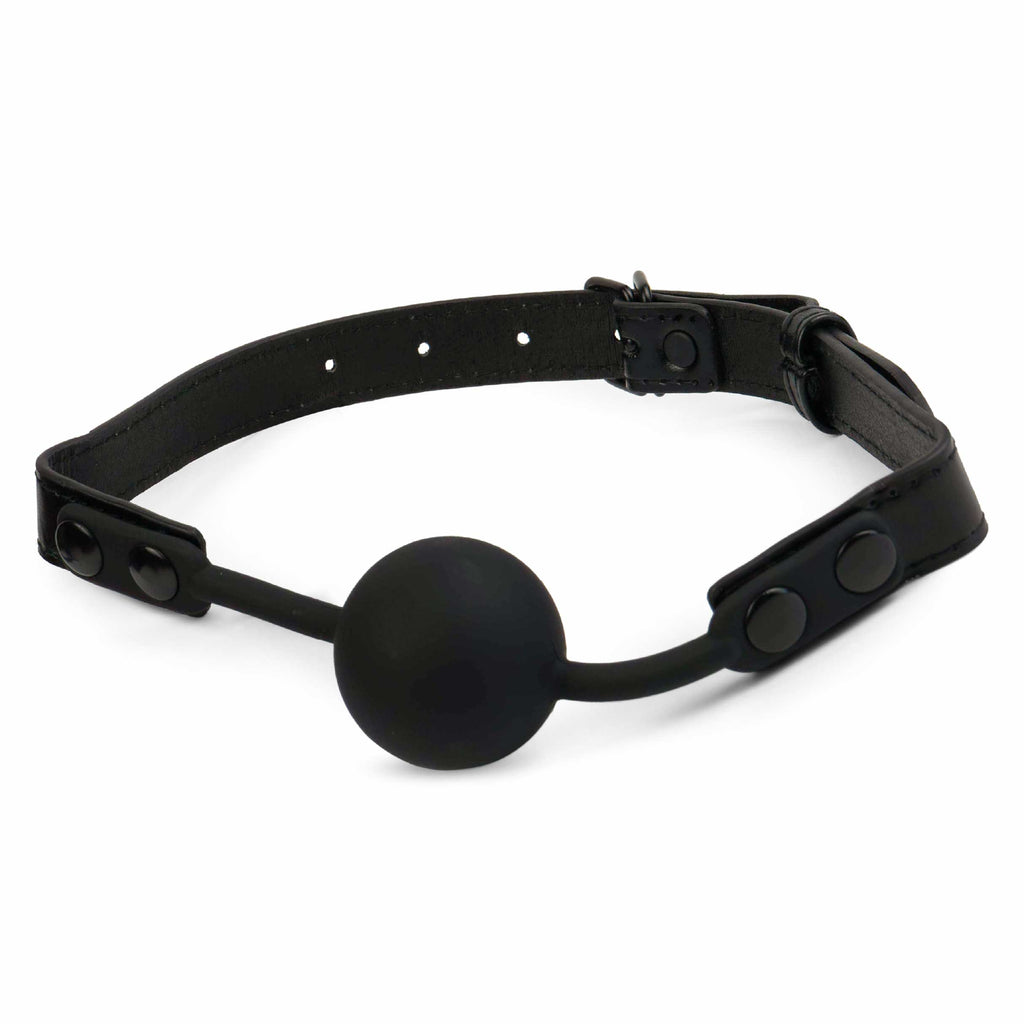 Midnight black silicone ball gag with adjustable straps, beginner-friendly mouth gag