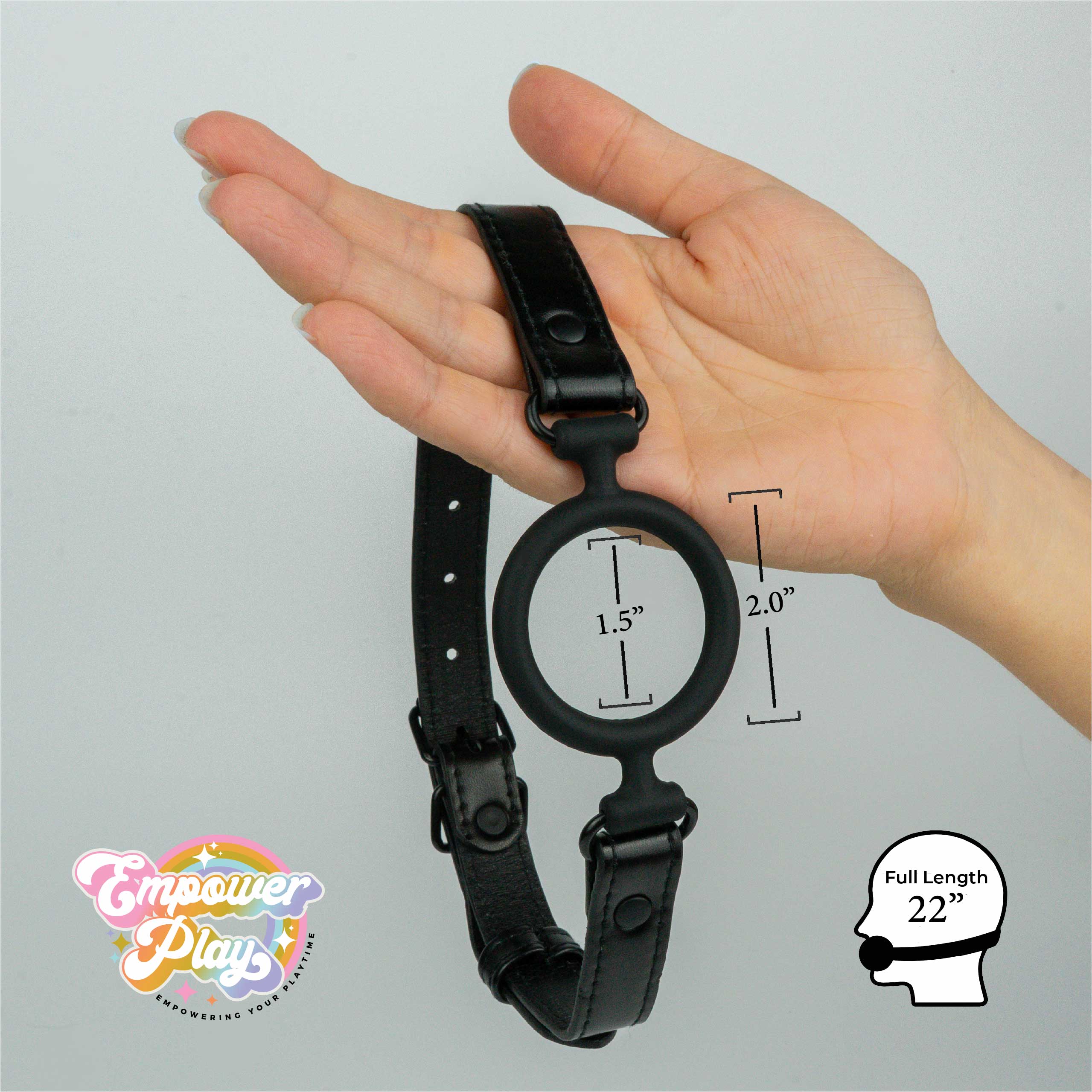Midnight black silicone O-ring gag shown in hand with size measurements for breathable open-mouth fit