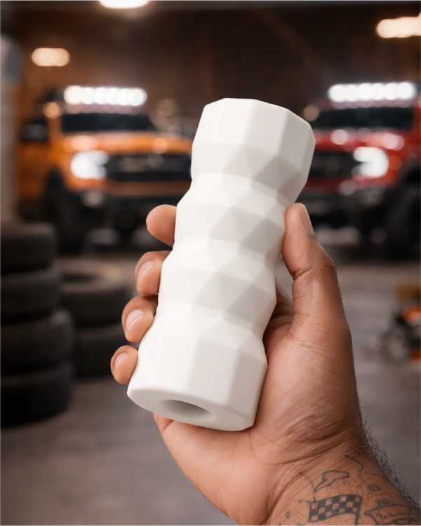 Raw Horsepower male stroker held in hand showing size scale and wide diameter grip