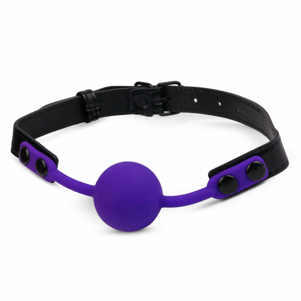 Royal purple silicone ball gag with adjustable straps, classic beginner mouth gag