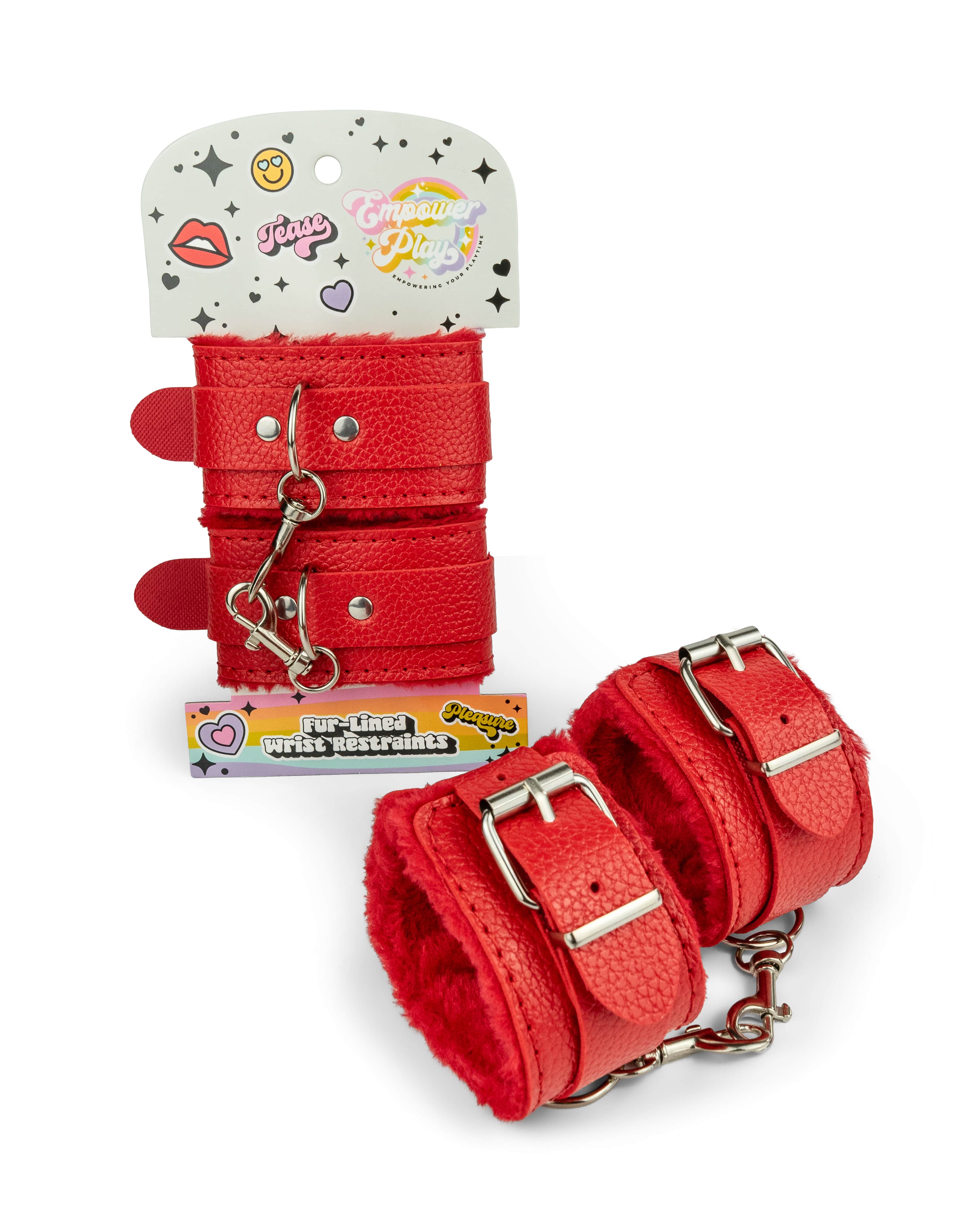 Scarlet red fur-lined wrist restraints shown in Empower Play retail packaging with plush cuffs displayed outside the package for bondage roleplay